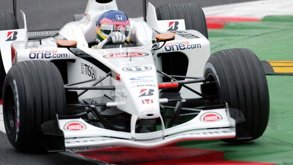 2002 Jacques Villeneuve Signed Race Used BAR Honda F1 Suit & Suit Display