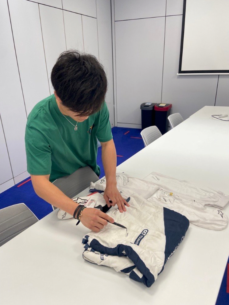 2021 Yuki Tsunoda Signed Race Used Rookie Season AlphaTauri F1 Suit - LV
