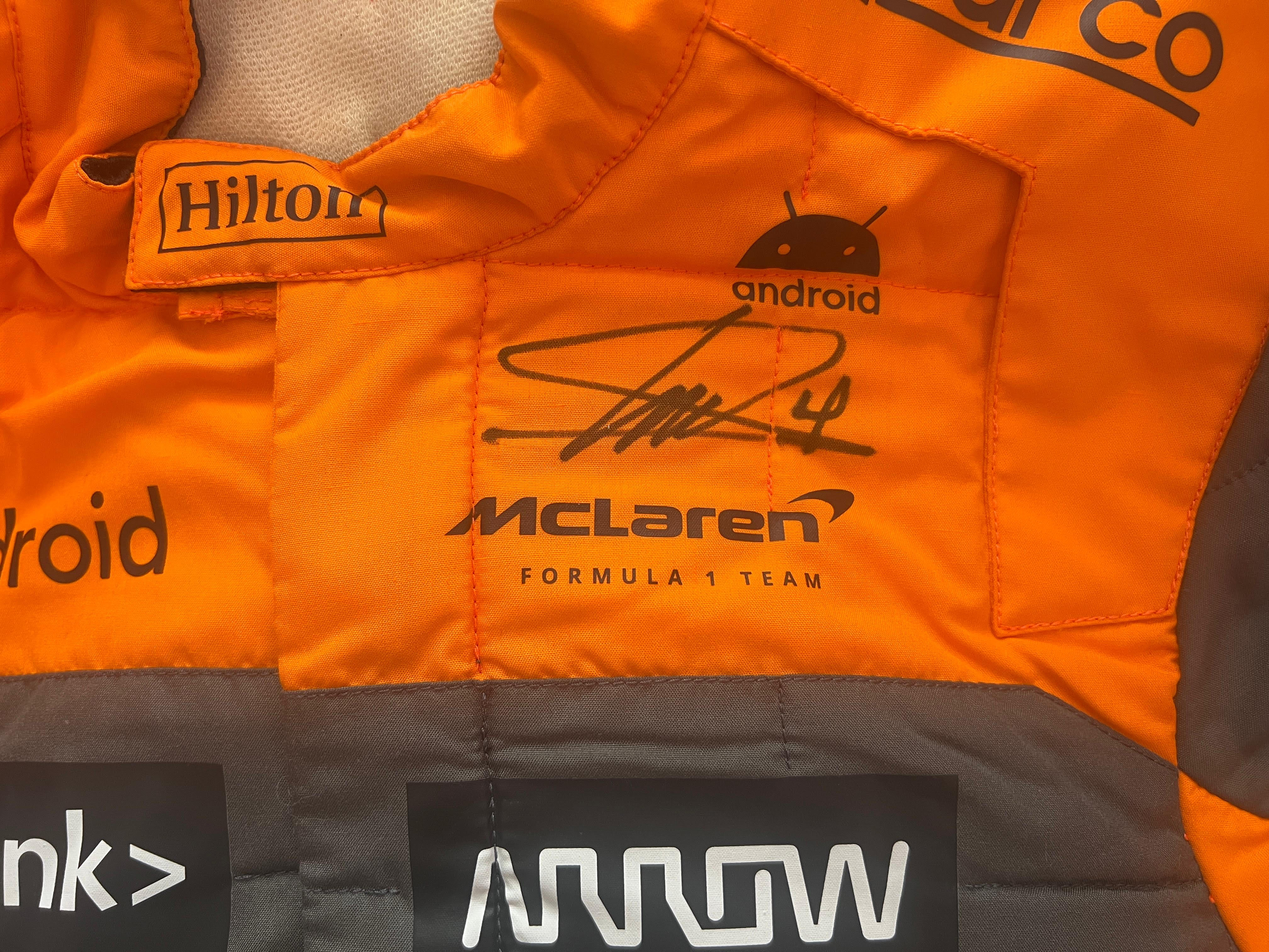 2023 Lando Norris Signed McLaren Original Worn F1 Suit - Charity Auction