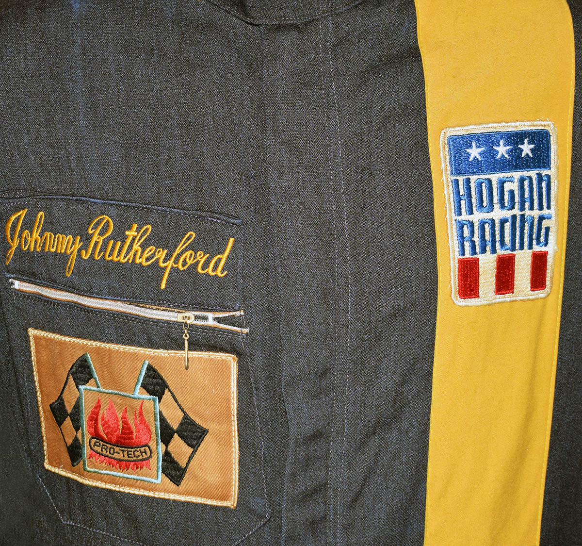 1974 Johnny Rutherford Race Used Hogan Racing F5000 Suit (now signed)