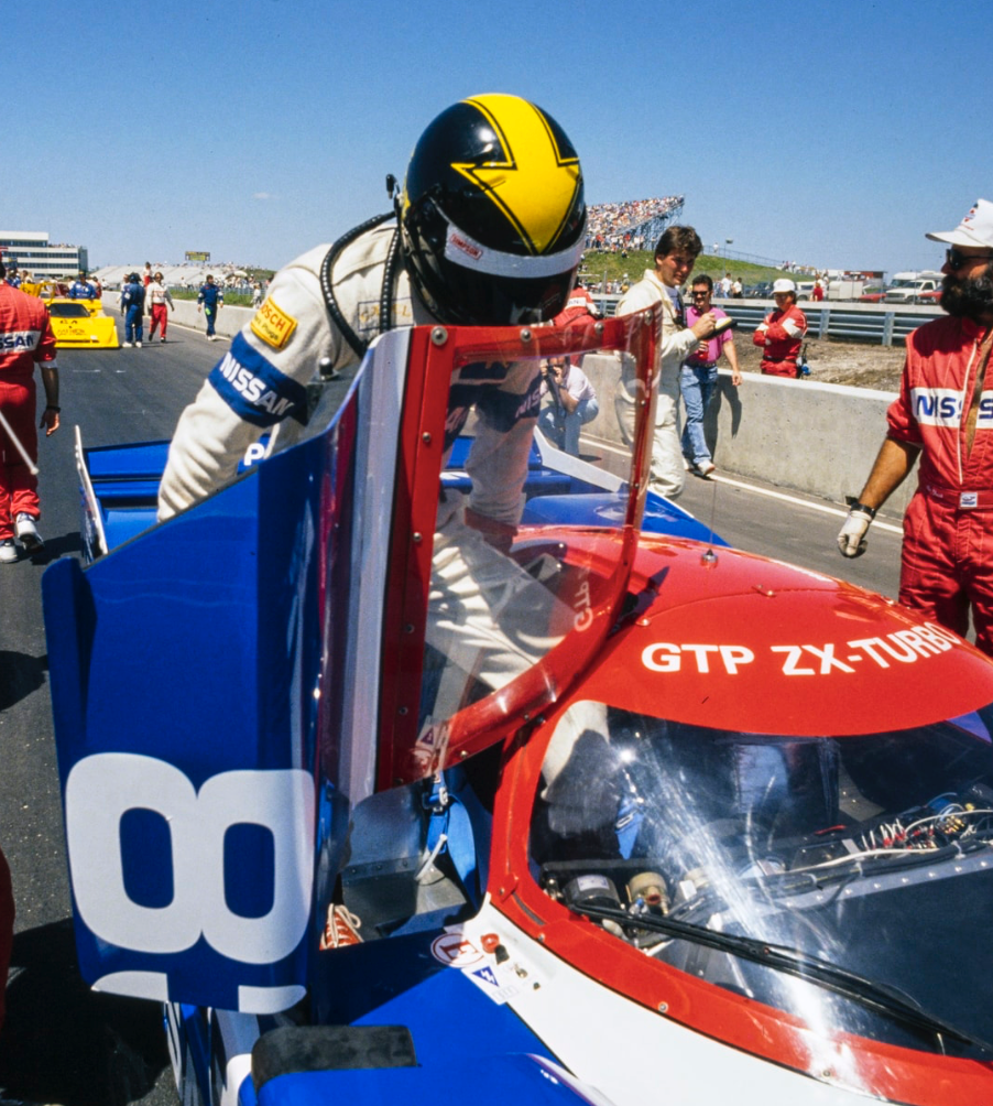 1990 Derek Daly Signed Race Used Le Mans 24 Hr / IMSA Win Nissan Suit + Track Test Series Helmet