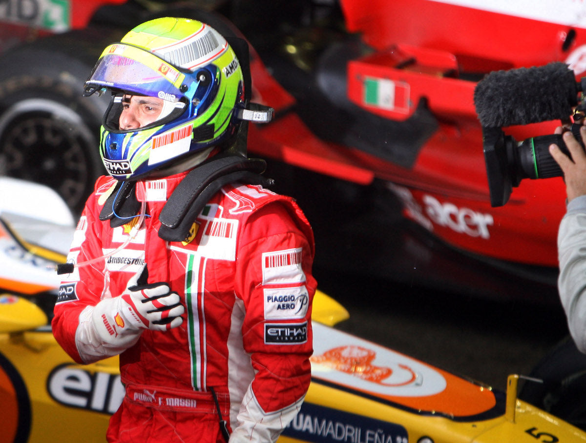 2008 Kimi Raikkonen/Felipe Massa Signed Race Used Ferrari F1 Gloves Set