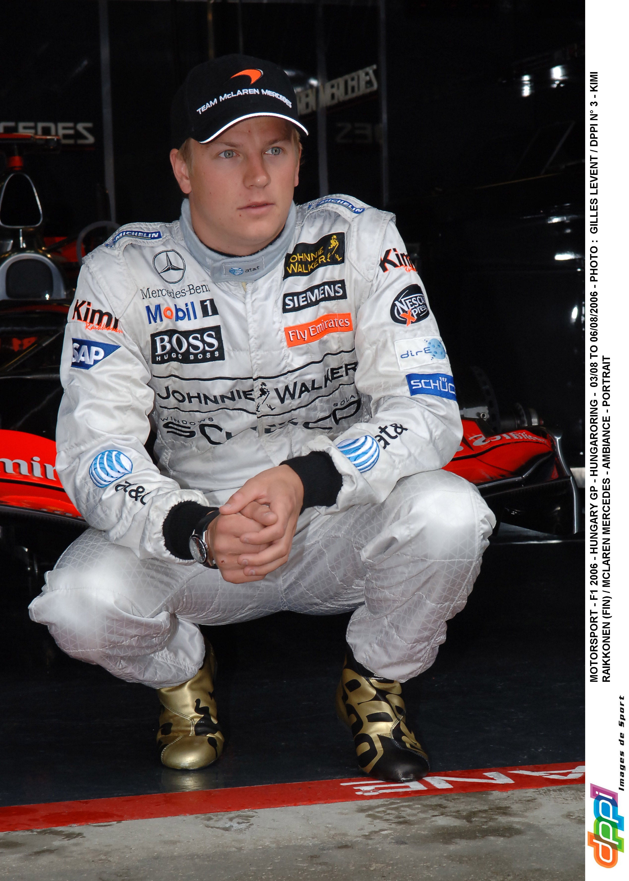 2006 Kimi Raikkonen Signed McLaren Johnnie Walker 100th Career Grand Prix Commemorative F1 Boots