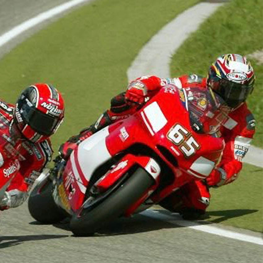2004 Loris Capirossi Signed Race Used Ducati Corse MotoGP Leathers