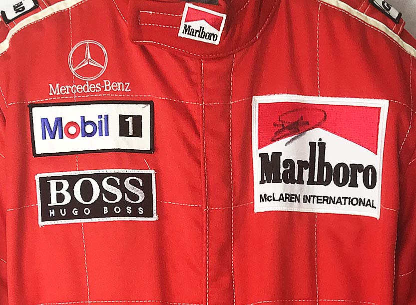 A set of used David Coulthard 1997 McLaren Mercedes race overalls by A set of used David Coulthard 1997 McLaren Mercedes race overalls by